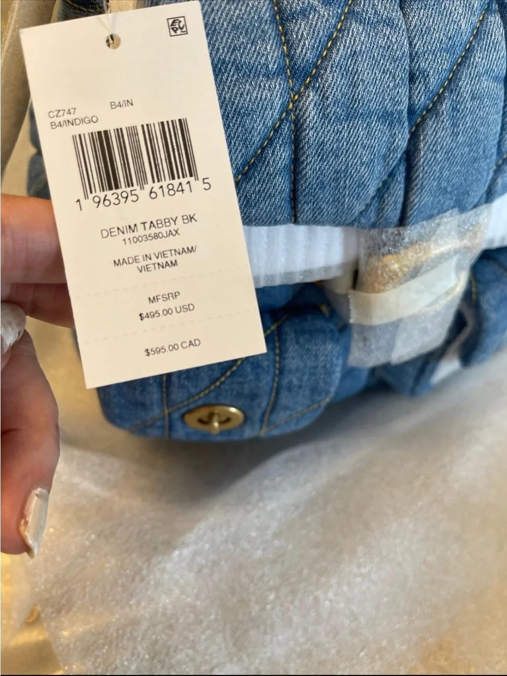 Coach quilted denim
